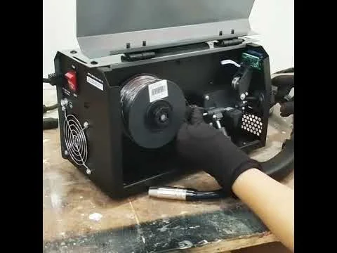 Thread the Wire Through the Drive System and Gun - how to install wire in mig welder